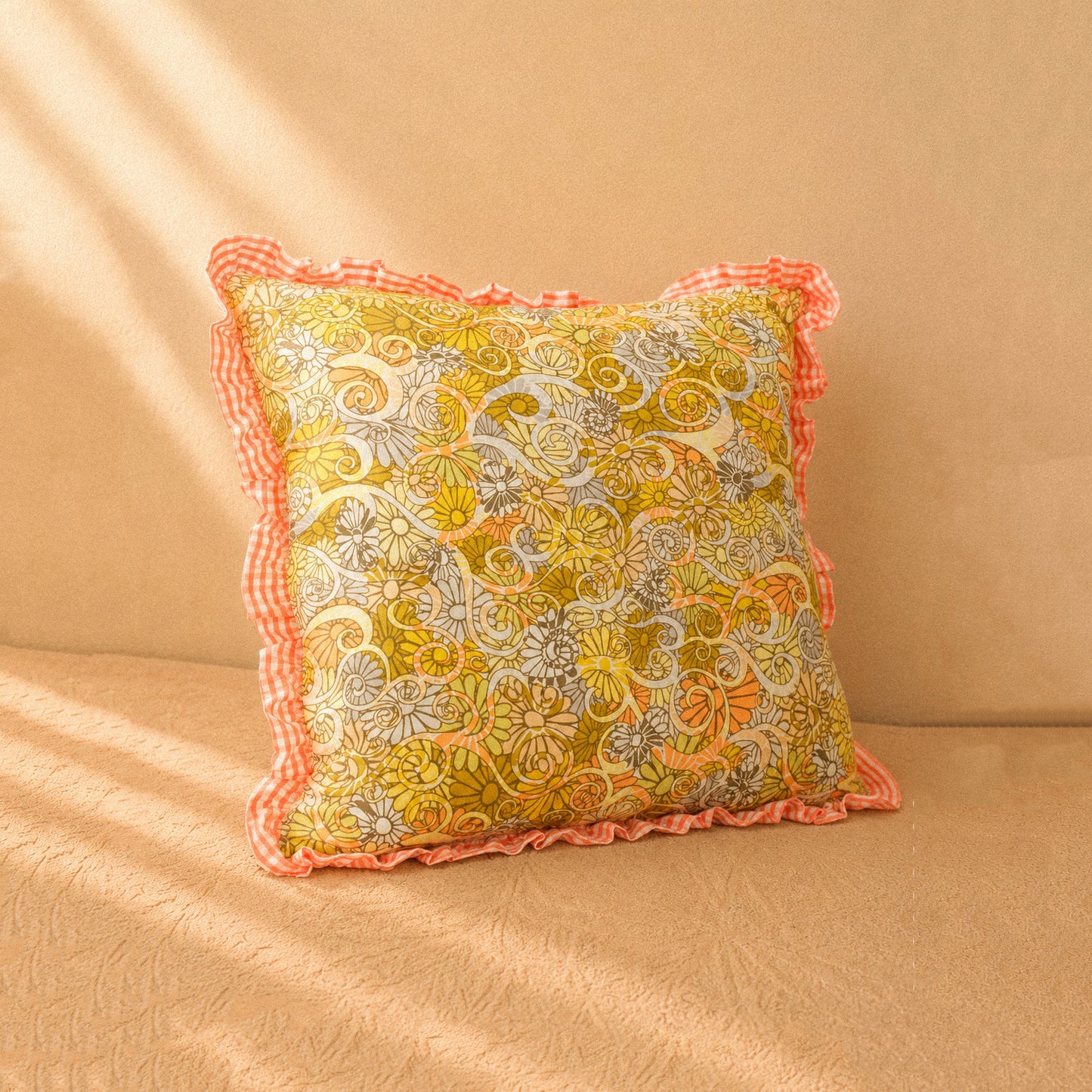 Square cushion with ruffles