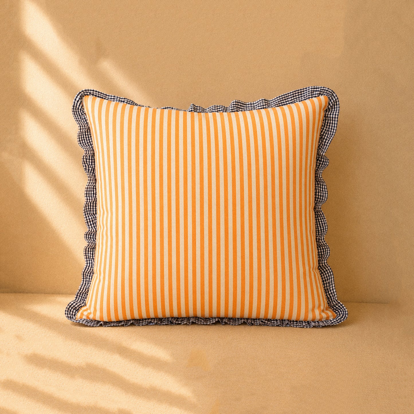 Square cushion with ruffles