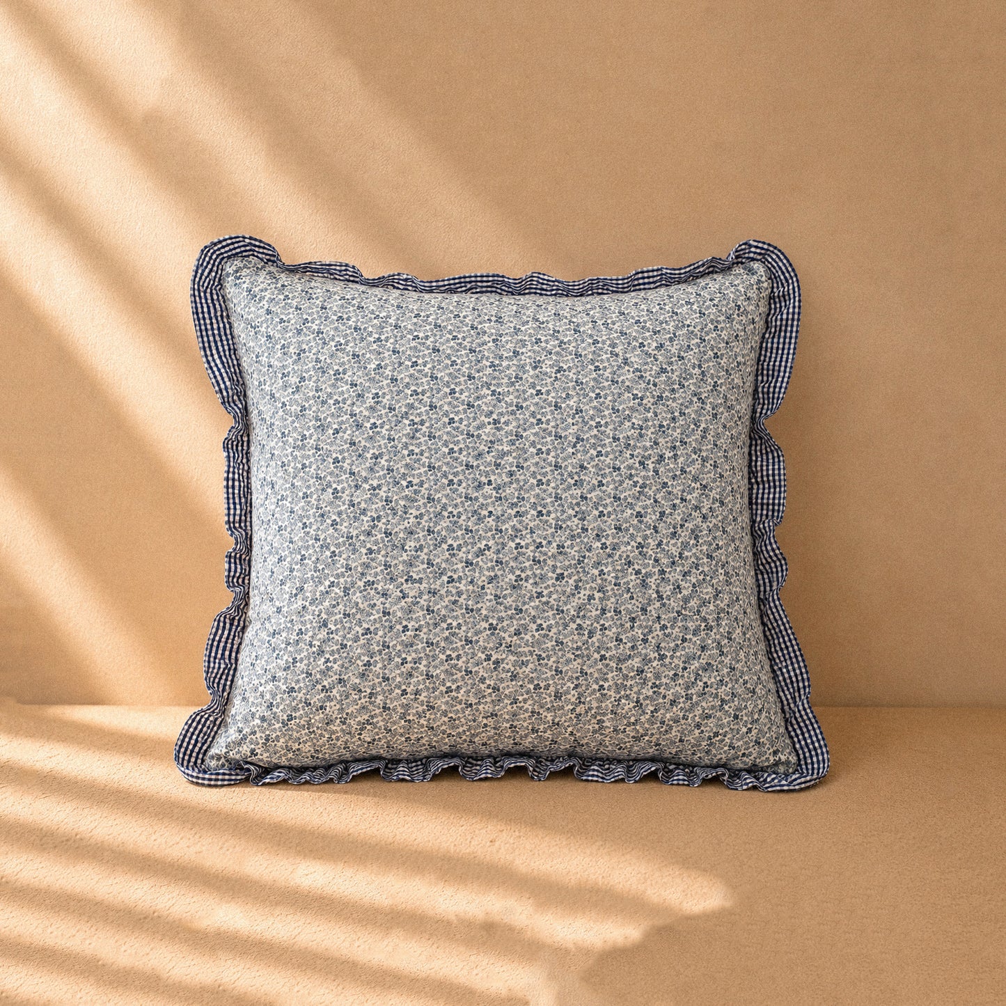 Square cushion with ruffles